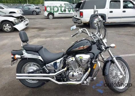 2001 Honda Shadow z USA, uszkodzony, nr VIN JH2PCT1311K221002